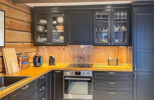 Tyinkrysset House | Spacious, pretty log cabin with sauna and fantastic panoramic view of the mountainous surroundings.