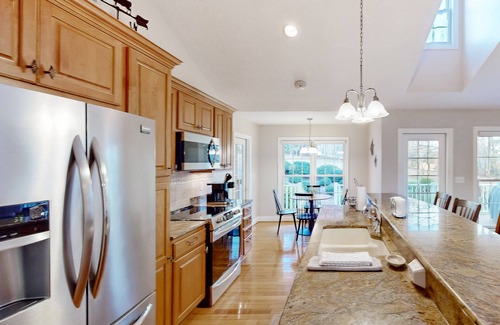 Huddleston House | Spacious retreat with golf course views, garden, deck, & pool