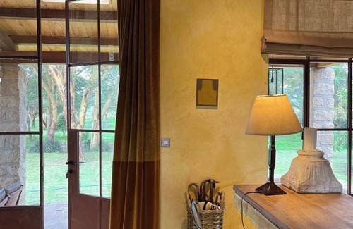 Naivasha House | Spacious safari villa with 3 suites, gardens, and wildlife views on Lake Naivasha.