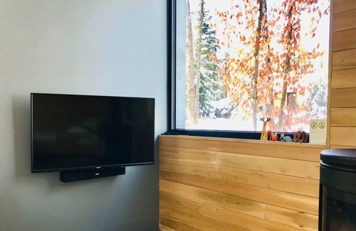 Lac Superieur Village Ski Chalet | Spahaus 7 Luxury Scandi Chalet + Hot Tub + EV Charger