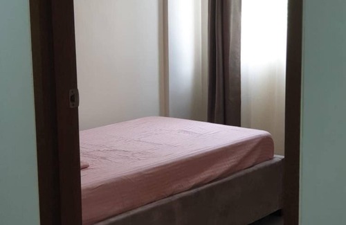San Dionisio Condo | Spanish Condo with Hot shower 15 min from Airport