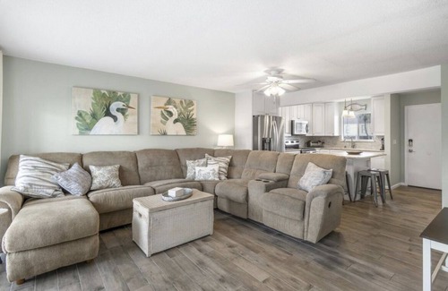 Holiday Isle Condo | SPC 3106 on a canal! Beach service included! Pools, Golf, Pickleball and more!