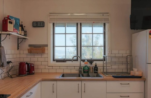 East Jindabyne Apartment | Spectacular views over Lake Jindabyne and the Snowy Mountains.