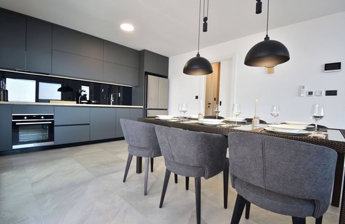 Podstrana Villa | Spectacular villa X with heated pool overlooking Split and sea