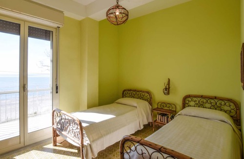 Bova Marina House | Spend an unforgettable vacation in this beautiful vacation home right on the beach.