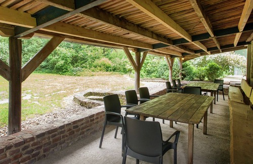 Municipality of Leudal House | Square-shaped farmhouse in a rural area.
