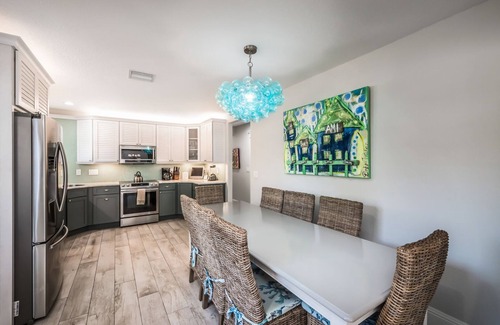 Holmes Beach House | Starfish Cottage: 1 Block to the Beach! Heated Pool, 4 King Beds by Anna Maria Life Vacation Rentals