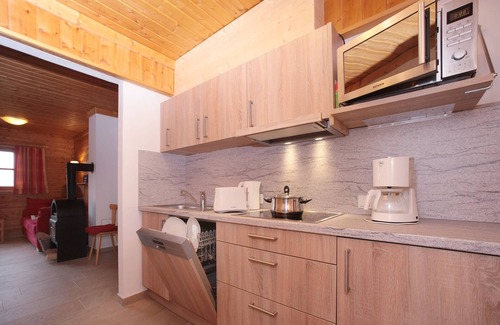 Hochkrimml Apartment | Staudi's ski hut Top9 in hut style directly on the piste Wood-burning stove