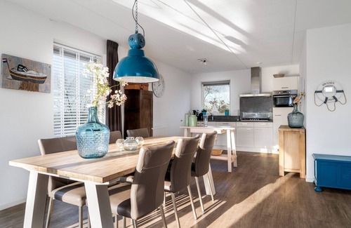 Akkrum House | Stay in our spacious Sneekermeer 6 home with private jetty.