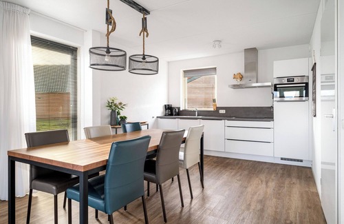 Akkrum House | Stay in our spacious Sneekermeer 6 home with private jetty.