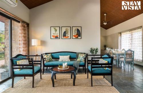 Anjaneri Villa | StayVista's Cerenity Castle - Lakeside Haven with Hill-View, Terrace & Indoor Entertainment