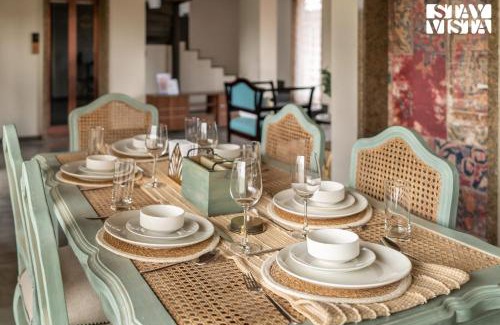 Anjaneri Villa | StayVista's Cerenity Castle - Lakeside Haven with Hill-View, Terrace & Indoor Entertainment
