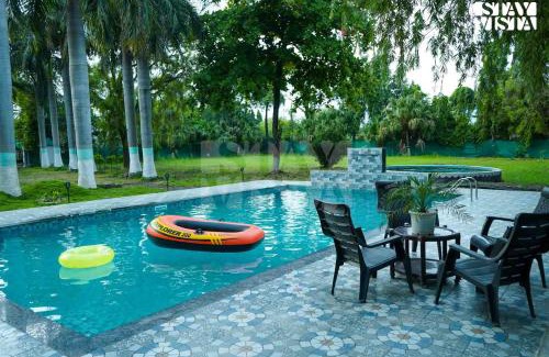 Bhopal Villa | StayVista's Palm Perle Villa - Pet-Friendly Retreat with Terrace, Lawn & Pool Table