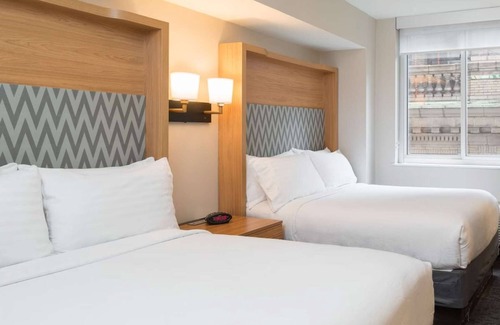 Financial District Hotel | Steps from Wall Street + Fitness Room & Wi-Fi