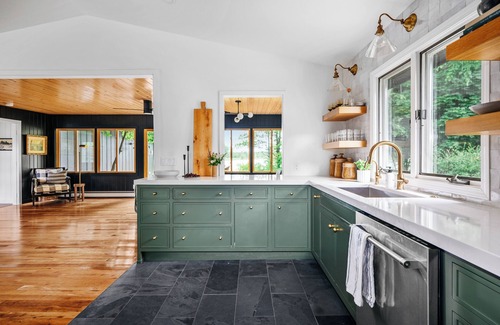 Omena Cottage | Stillwater Cottage - lakefront with chefs kitchen, fireplace, firepit
