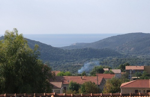 Monacia-d'Aullene House | Stone house in a typical village, sea view,