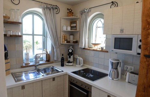 Fehmarnsund Condo | Strandhaus-fehmarn, Captains-deck, Strandlage und Meerblick, Terrasse und Garten