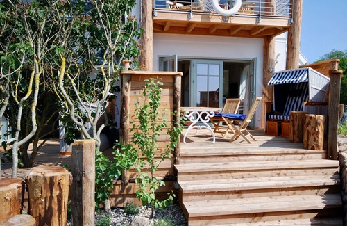 Fehmarnsund Condo | Strandhaus-fehmarn, Captains-deck, Strandlage und Meerblick, Terrasse und Garten