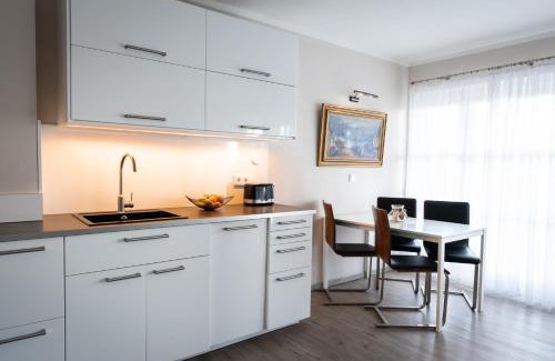 Schonberger Strand Apartment | Strandwohnung mit großer Terrasse in erster Reihe am Schönberger Strand, Kajak, Wallbox, 24h self check-in, DisneyPlus
