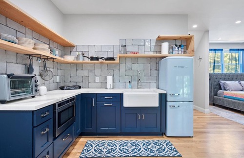 Matthews House | Studio above a detached garage away from main house on a private lot.