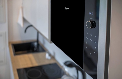 Furstenfeldbruck District Apartment | Studio Apartment "Huber Living Single 101" with Balcony & Wi-Fi