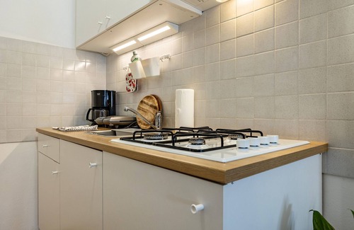 Malcesine Apartment | Studio Apartment 'Panoramic Green' with Lake View, Private Terrace and Wi-Fi