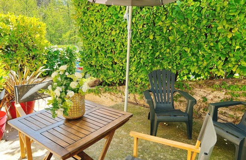 Panatieri Apartment | Studio Corté, private terrace, parking and air conditioning near the town center