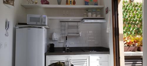 Juquehy Apartment | Studio e Suite no Centro de Juquehy a 200mts da praia - Varanda e Serviço de Praia - E MAIS Ofurô - Cozinha e Estacionamento nas unidades "STUDIO"