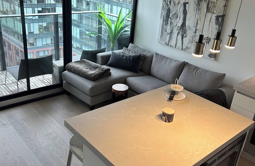 Wellington Place Condo | Stunning 2 storey large 1 bedroom loft in King Street West community on PH Level
