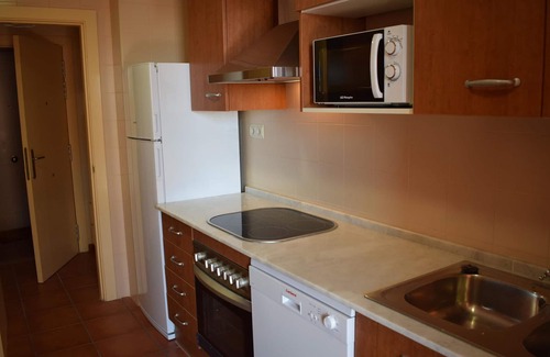 L Almadrava Apartment | Stunning 3-Bedroom Duplex with Pool, Terrace & Parking Near Pristine Beaches