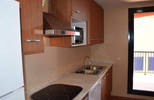 L Almadrava Apartment | Stunning 3-Bedroom Duplex with Pool, Terrace & Parking Near Pristine Beaches