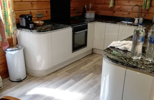 Portsonachan Cabin | Stunning 3 Bedroom Lodge with Sauna ,Hot Tub and Lochside Leisure Deck