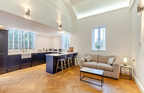 Dunmow Cottage | Stunning converted chapel with a spacious living area.