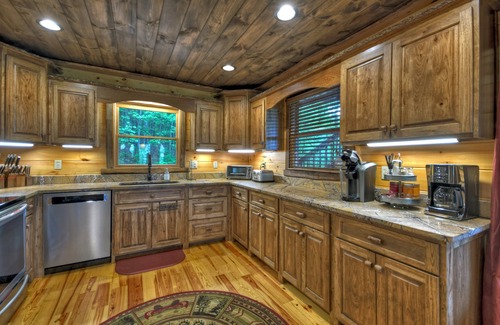 Raccoon Ridge Cabin | Stunning forested views, hot tub, fire pit, pool table!