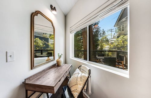 Cedar Glen House | Stunning lakehouse lodge with a deck, fireplace, lush patio & lake access