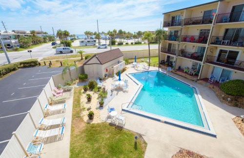 New Smyrna Beach Apartment | Stunning Ocean Views STEPS from the Beach with Pool! Fabulous 4th Floor Studio!