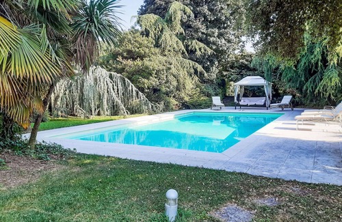 Rovato Villa | Stunning private villa with A/C, hot tub, private pool, WIFI, TV, patio, pets allowed and parking