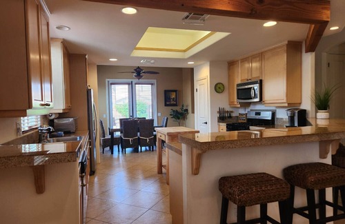 Desert Club Estates House | Stunning Santa Fe Pool Home Steps to Park and Village LIC# 068222