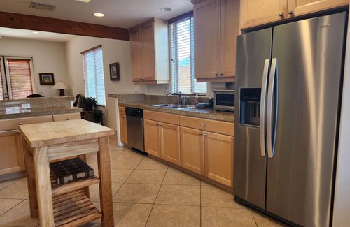 Desert Club Estates House | Stunning Santa Fe Pool Home Steps to Park and Village LIC# 068222