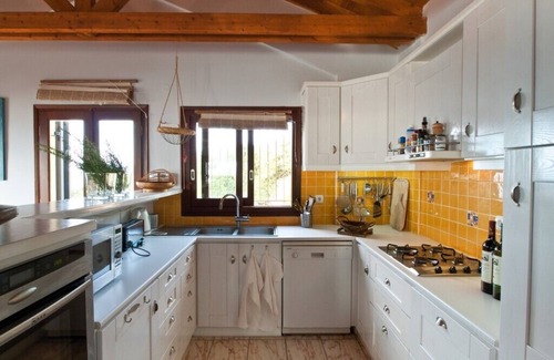 Fiskardo Villa | Stunning Villa in an amazing setting above the beach. Stunning sunsets assured.