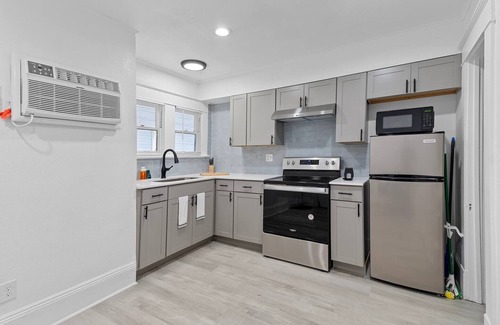 Lake Eola Heights House | Stylish 1BR Orlando Suite Kitchen + Wi-Fi