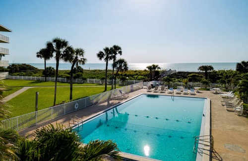 Avon By The Sea Condo | Stylish Beachfront Condo – Balcony, Heated Pool & Steps to Pier
