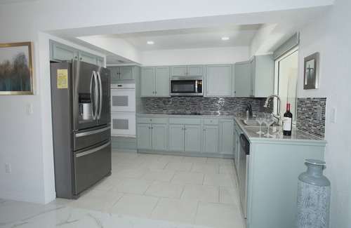 Punta Gorda House | Stylish Canal Home with King Bed and Lanai and Fishing dock