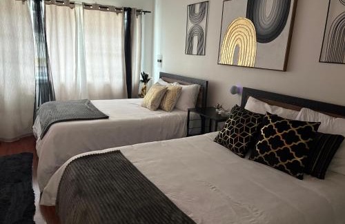 Atlantic City House | Stylish Cozy Quiet Family Retreat and Romantic getaway Sleeps up to 7 with Fast Wifi, Free Parking, Work station, Alexa enabled, Fenced in Backyard for Pets Grill Party Patio, Porch, Beach, Canal, stadium,Boardwalk Restaurants, and much more!