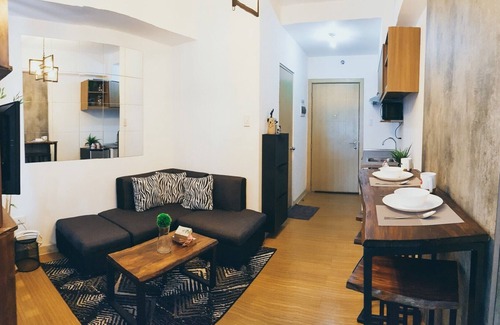 Ususan Condo | Stylish Home Near Airport and Cities