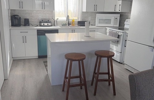 Bridlewood House | “Stylish Home Near Social Amenities | Free Parking + Garage” in SW Area, Calgary