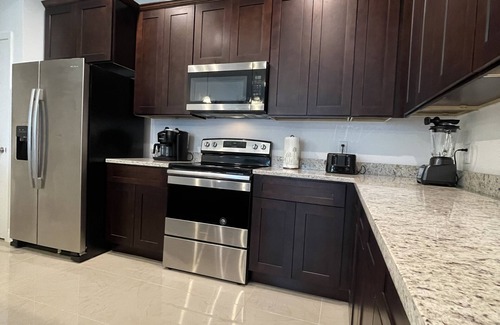 Haines City House | Stylish Kissimmee Getaway Game Room – 99 Dollar Deal!