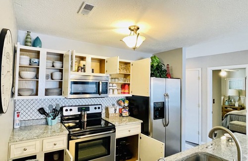 Osage Beach Condo | Stylish Lakefront, King Bed Suite, Sunset View, Pool, Boat Slip, PrivateTopFloor