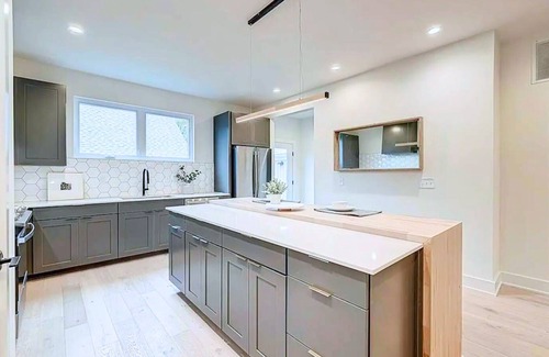Fall Creek Place House | Stylish Oasis: 4BR, Hot Tub, Near Downtown