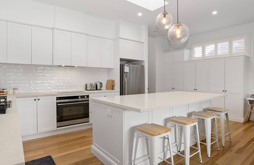 Warners Bay House | Stylish, private lakeside retreat complete with sparkling inground swimming pool. Sleeps 10.